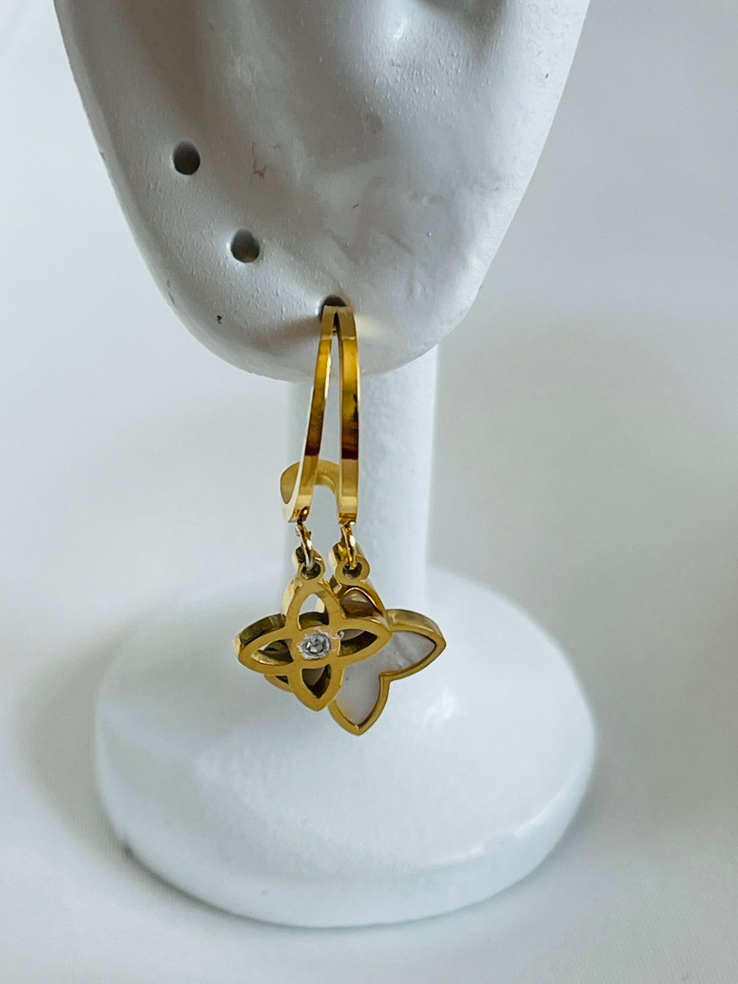 Dangling charm earrings