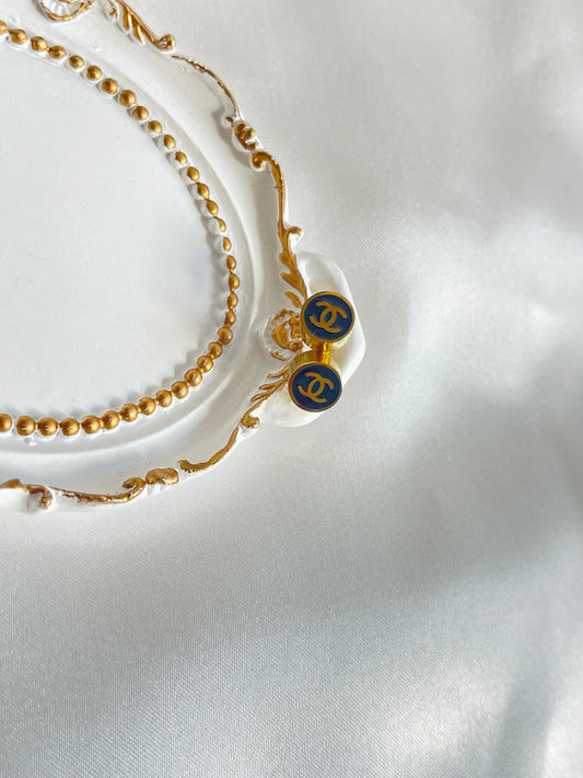 Black and gold studs
